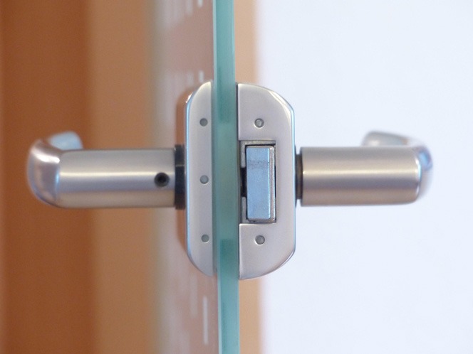 Modern through glass door lever and latch